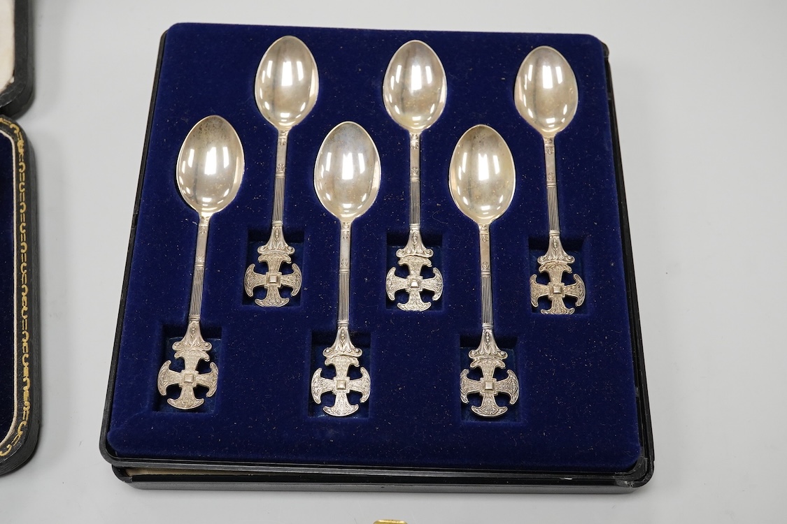 A cased Edwardian silver christening pair by Goldsmiths and Silversmiths Co Ltd, London, 1905, two cased sets of six silver teaspoons, one with a pair of sugar tongs, one other cased silver christening pair, a cased set